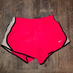 Pink Nike running shorts